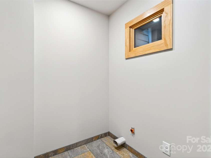 575 Croft Way, Bakersville, NC 28705.  MLS# CAR4313394, YatesRealty ID 386. Laundry