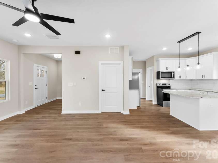 906 Brunett Street, Gastonia, NC 28052.  MLS# CAR4340368, YatesRealty ID 3860. Den with fireplace - Model Home