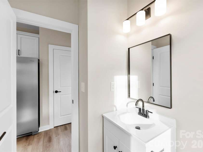 906 Brunett Street, Gastonia, NC 28052.  MLS# CAR4340368, YatesRealty ID 3860. Downstairs Half Bath - Model Home