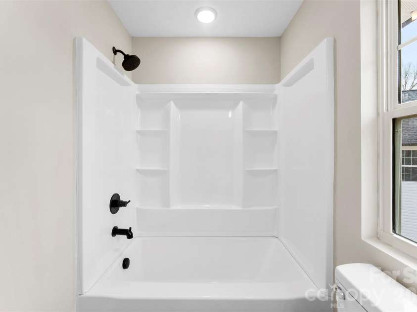 906 Brunett Street, Gastonia, NC 28052.  MLS# CAR4340368, YatesRealty ID 3860. Hall Full Bathroom Upstairs- Model Home