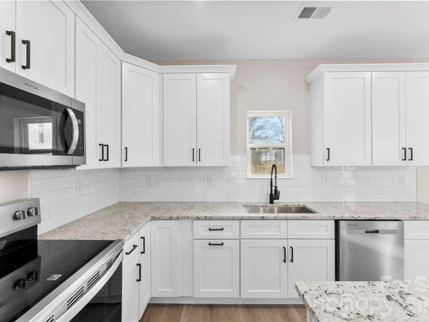 906 Brunett Street, Gastonia, NC 28052.  MLS# CAR4340368, YatesRealty ID 3860. Kitchen - Model Home