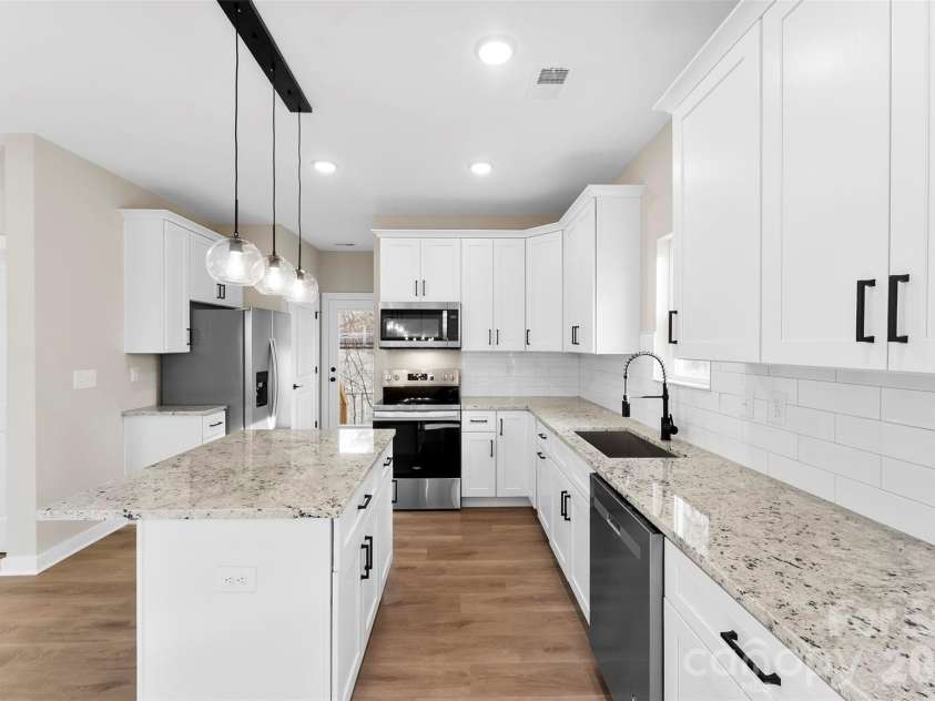 906 Brunett Street, Gastonia, NC 28052.  MLS# CAR4340368, YatesRealty ID 3860. Kitchen - Model Home