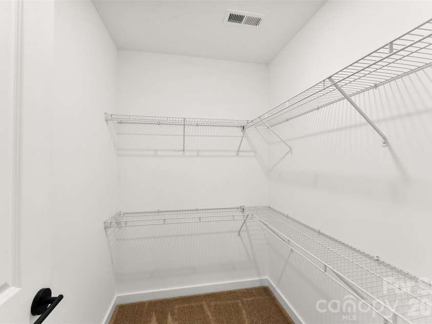 906 Brunett Street, Gastonia, NC 28052.  MLS# CAR4340368, YatesRealty ID 3860. Primary Bedroom Closet - Model Home