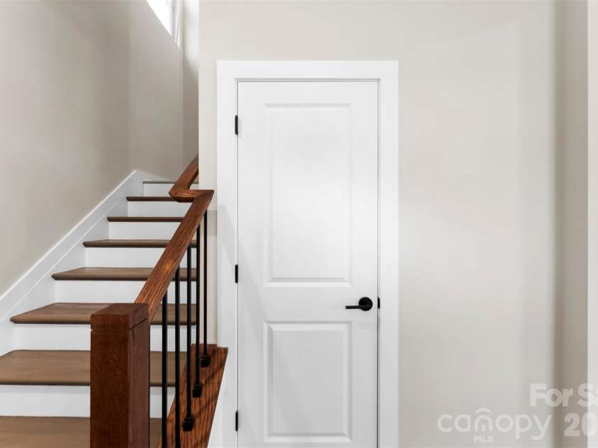 906 Brunett Street, Gastonia, NC 28052.  MLS# CAR4340368, YatesRealty ID 3860. Stairs to Upper Level - Model Home