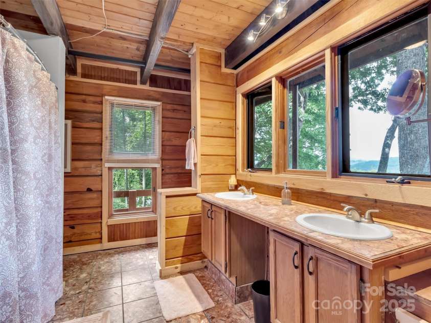 770 Shelton Cove Road, Waynesville, NC 28785.  MLS# CAR4240976, YatesRealty ID 3861. 