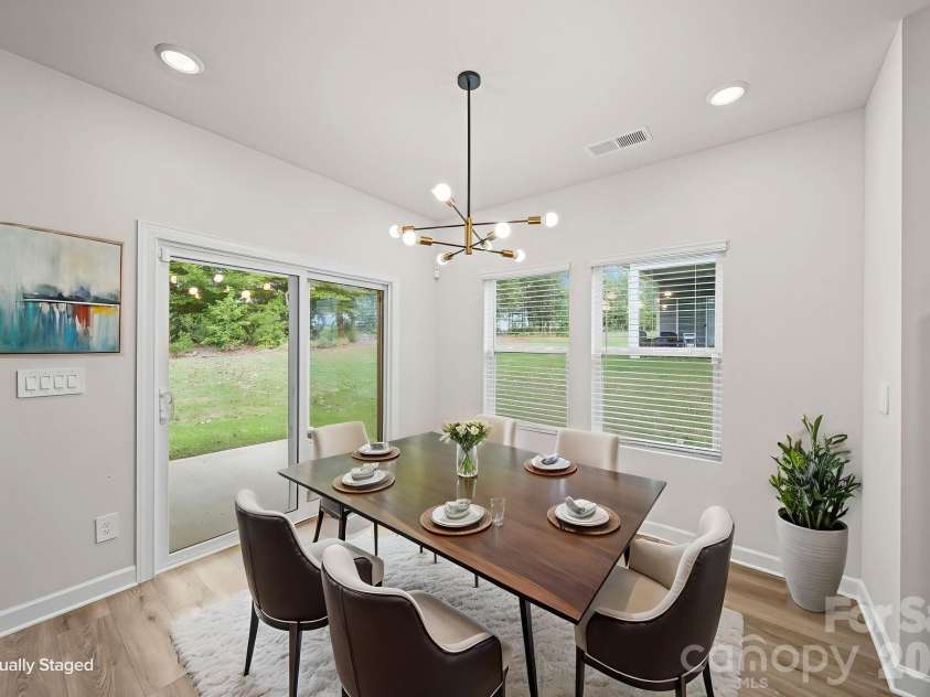 6220 Barcelona Way, Charlotte, NC 28214.  MLS# CAR4404198, YatesRealty ID 38615. Virtually staged dining area