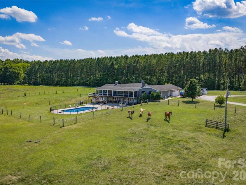 1425 Hobson Road, Cleveland, NC 27013.  MLS# CAR4396751, YatesRealty ID 38625. 5 bed/4.5 bath on private acreage