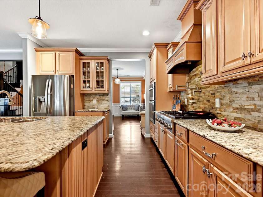 12902 Blakemore Avenue, Huntersville, NC 28078.  MLS# CAR4403462, YatesRealty ID 38626. Kitchen with leathered kitchen granite