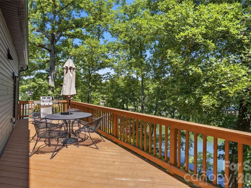 18532 Rosapenny Road, Charlotte, NC 28278.  MLS# CAR4404248, YatesRealty ID 38627. Grill and entertain from spacious deck