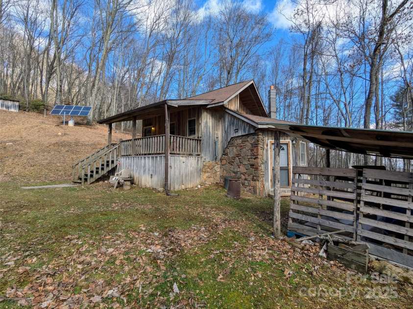 10120 Meadow Fork Road, Hot Springs, NC 28743.  MLS# CAR4218136, YatesRealty ID 3864. Looking uphill towards the solar panels