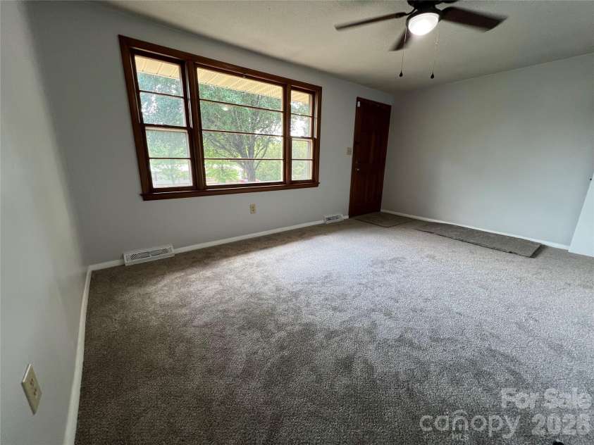 649 Pine Extension, Forest City, NC 28043.  MLS# CAR4366427, YatesRealty ID 38642. Living room