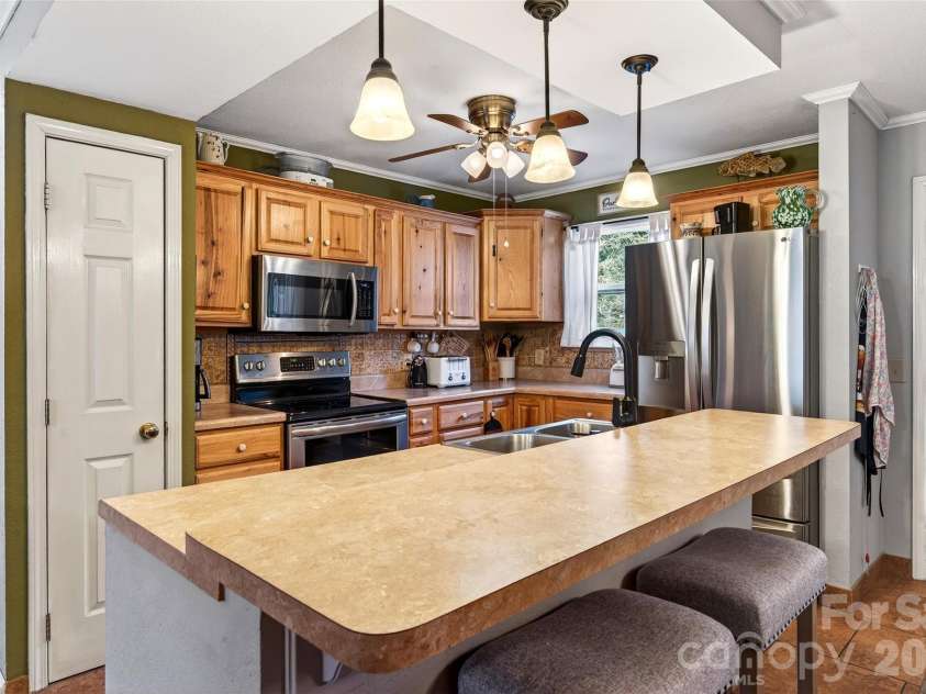 263 Fairway Lane, Spruce Pine, NC 28777.  MLS# CAR4338354, YatesRealty ID 3865. 