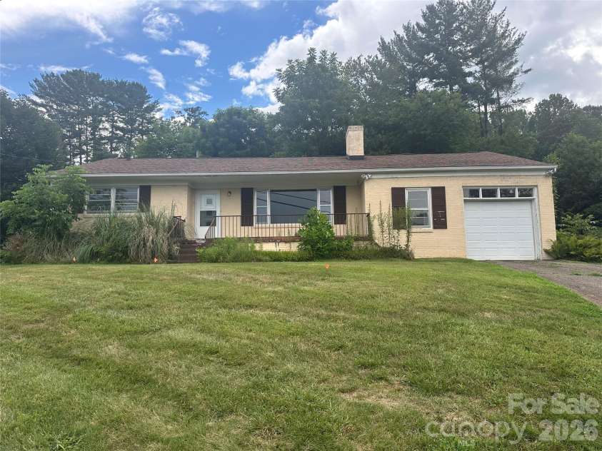 610 Enka Lake Road, Candler, NC 28715.  MLS# CAR4405390, YatesRealty ID 38657. 