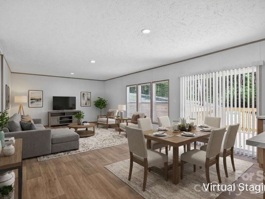 170 Harvick Lane, Lexington, NC 27292.  MLS# CAR4381928, YatesRealty ID 38659. Dining area/Den virtually staged