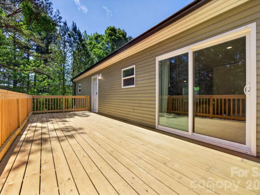 170 Harvick Lane, Lexington, NC 27292.  MLS# CAR4381928, YatesRealty ID 38659. Huge 10' x 24' deck!