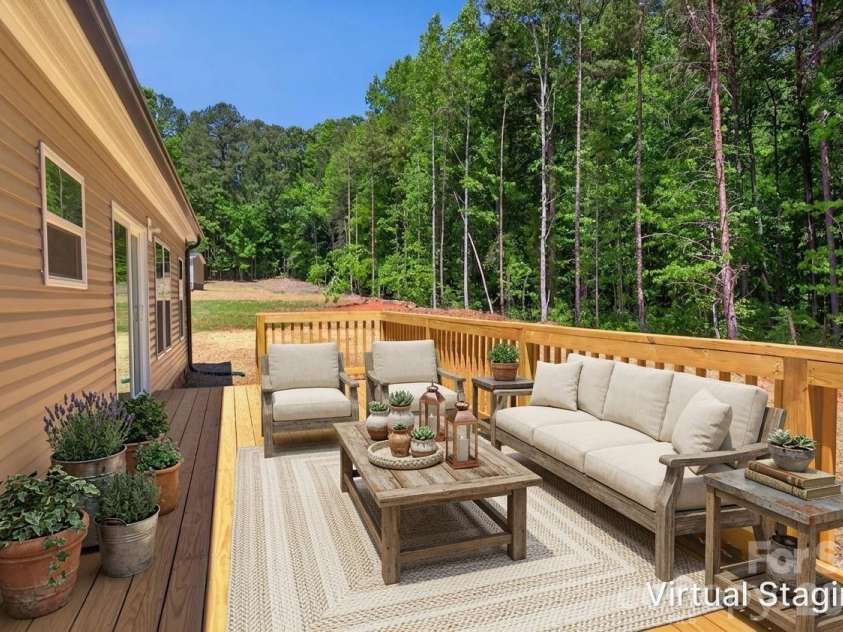 194 Harvick Lane, Lexington, NC 27294.  MLS# CAR4381941, YatesRealty ID 38660. Deck - Virtually Staged