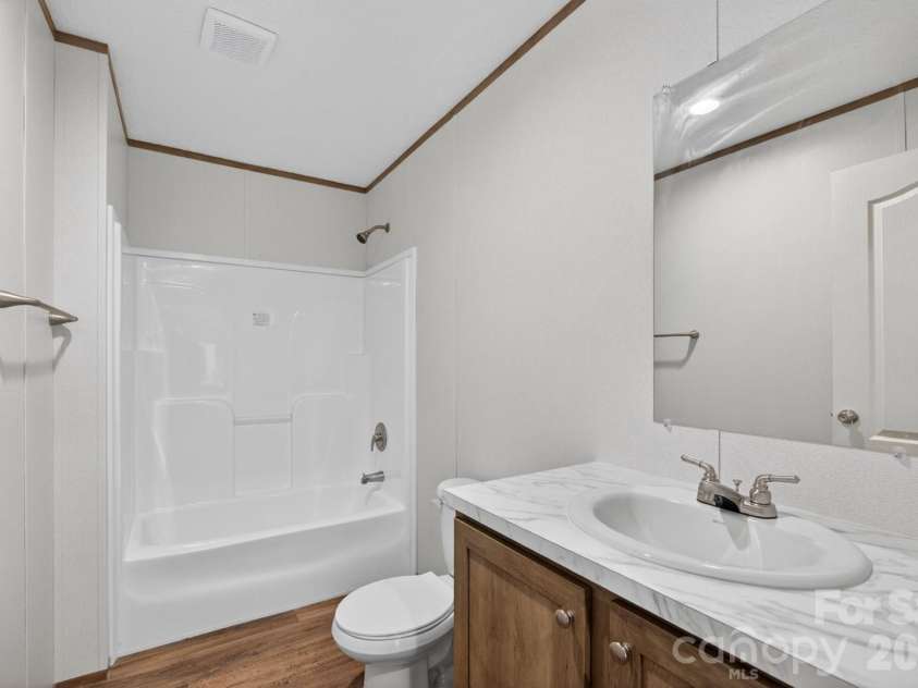 194 Harvick Lane, Lexington, NC 27294.  MLS# CAR4381941, YatesRealty ID 38660. Hall bath