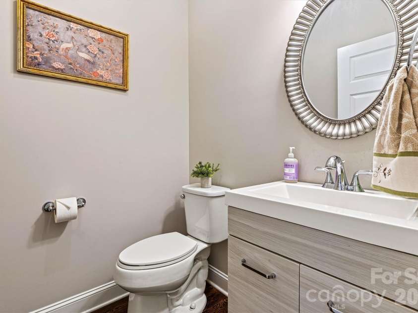 6515 Havencrest Drive, Denver, NC 28037.  MLS# CAR4403228, YatesRealty ID 38662. Half bathroom on main level for guests