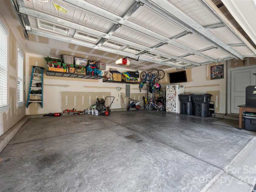 17622 Austins Creek Drive, Charlotte, NC 28278.  MLS# CAR4278255, YatesRealty ID 3867. Plenty of storage and room in this garage.