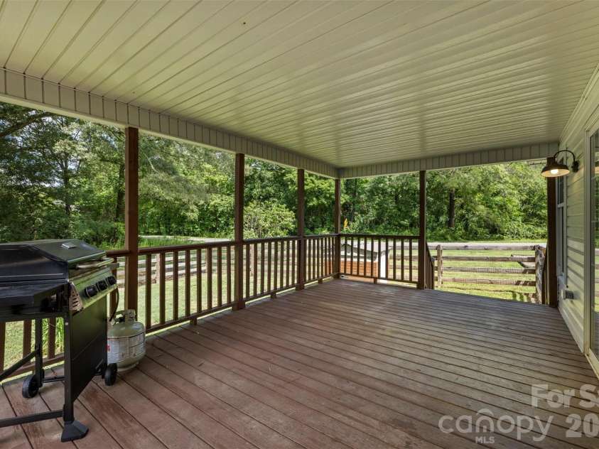 6121 Sikes Mill Road, Monroe, NC 28110.  MLS# CAR4395978, YatesRealty ID 38670. Large back deck