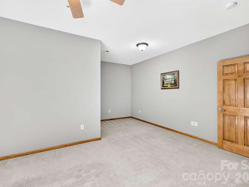 149 Oriole Road, Brevard, NC 28712.  MLS# CAR4404577, YatesRealty ID 38675. Spacious bedroom with multiple layout possibilities and abundant natural light.