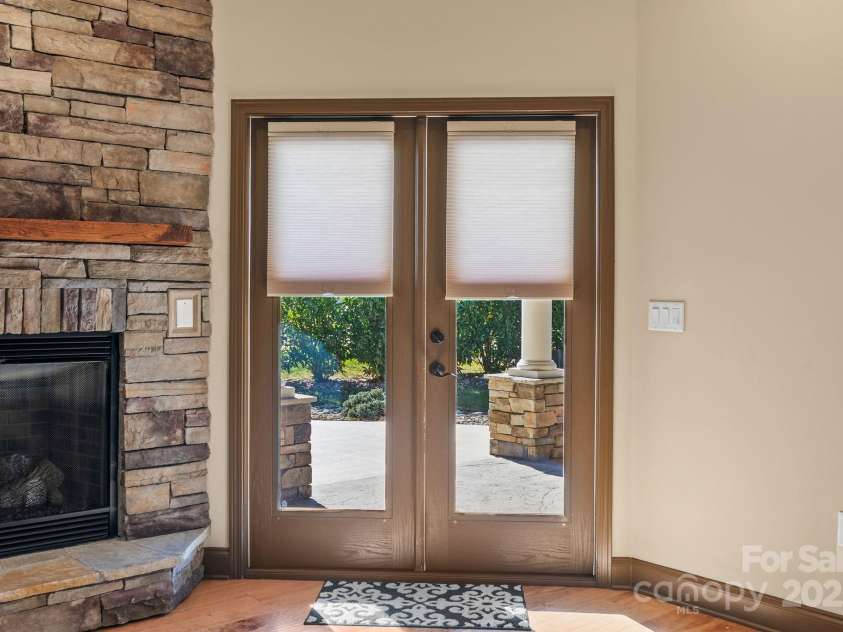 4 Pacifico Drive, Asheville, NC 28806.  MLS# CAR4318264, YatesRealty ID 3868. Doors Lead to Covered Patio