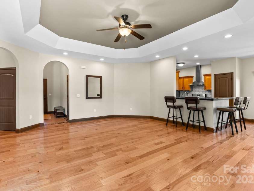 4 Pacifico Drive, Asheville, NC 28806.  MLS# CAR4318264, YatesRealty ID 3868. Living Room Opens to Kitchen and Dining 