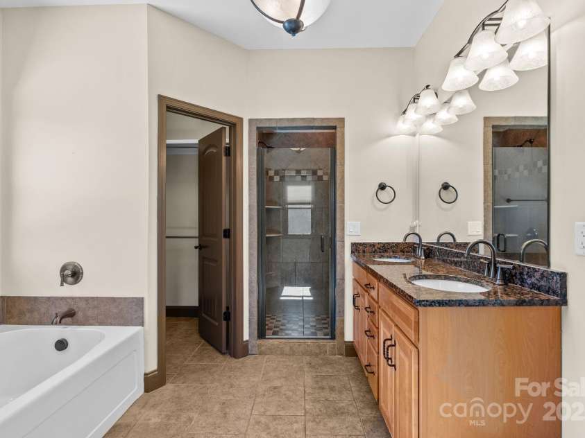 4 Pacifico Drive, Asheville, NC 28806.  MLS# CAR4318264, YatesRealty ID 3868. Thoughtfully Designed Primary Bathroom