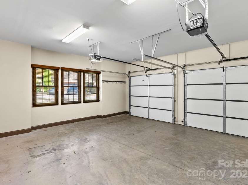 4 Pacifico Drive, Asheville, NC 28806.  MLS# CAR4318264, YatesRealty ID 3868. Two-Car Garage with Room for Storage 