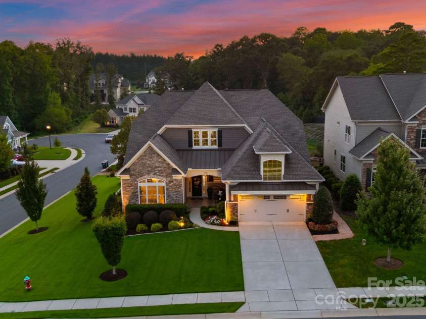 1035 Chippenham Avenue, Lancaster, SC 29720.  MLS# CAR4294660, YatesRealty ID 38680. Stunning front elevation at sunset with inviting curb appeal.