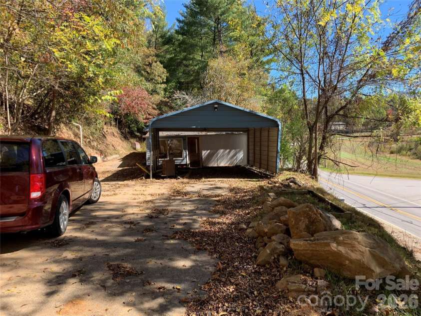 465 Bee Tree Road, Swannanoa, NC 28778.  MLS# CAR4367648, YatesRealty ID 38683. Carport