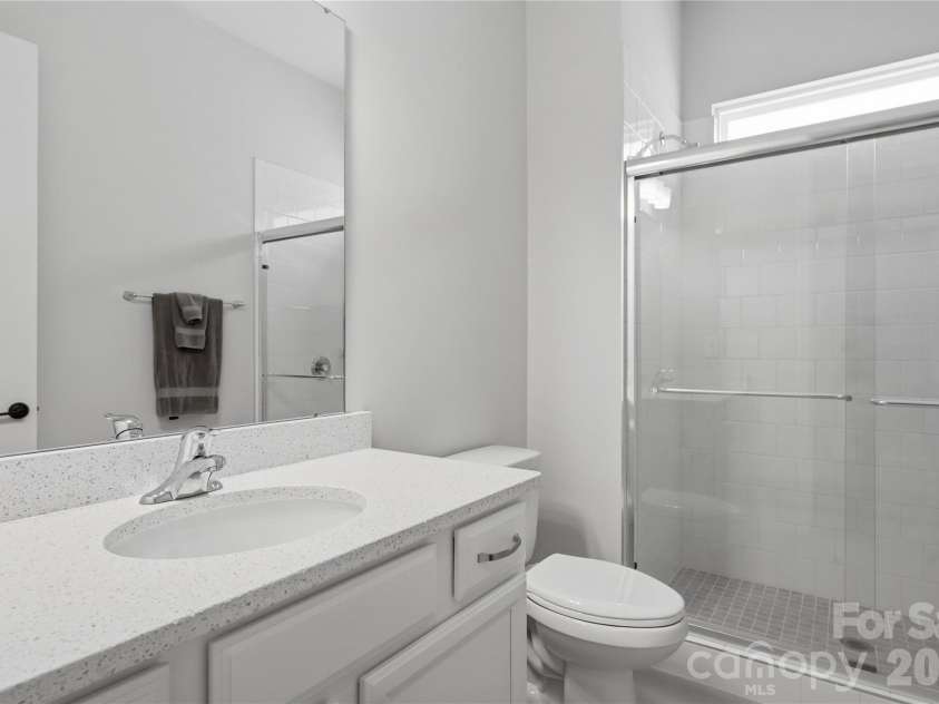 4010 Patsy Drive, Mint Hill, NC 28227.  MLS# CAR4403720, YatesRealty ID 38689. Downstairs full bath