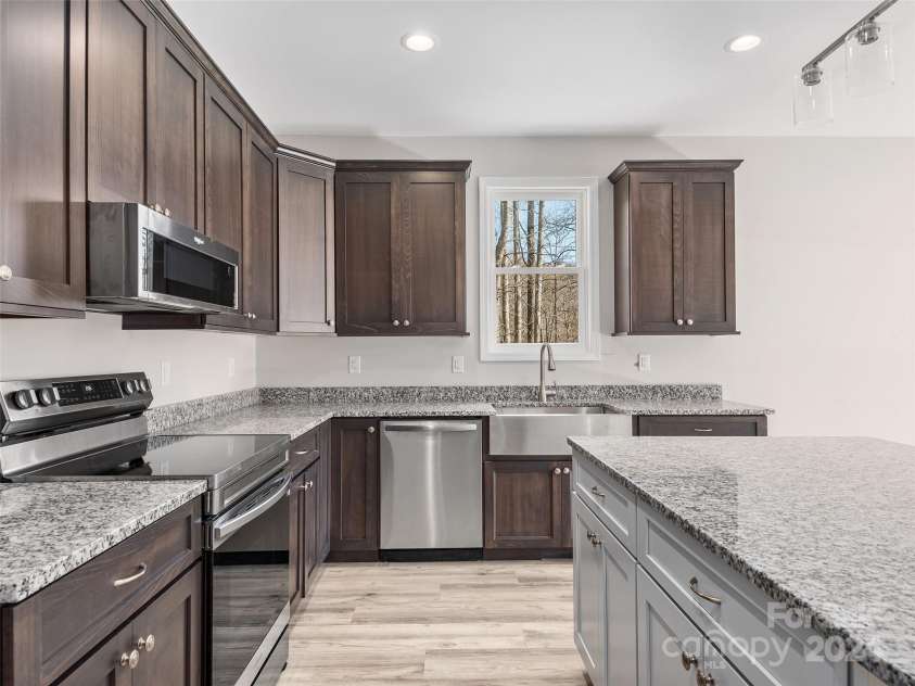 46 Smokey Quartz Lane, Flat Rock, NC 28731.  MLS# CAR4208463, YatesRealty ID 387. Beautiful Kitchen with SS Appliances
