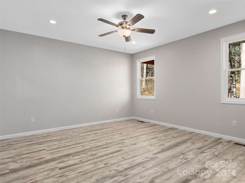 46 Smokey Quartz Lane, Flat Rock, NC 28731.  MLS# CAR4208463, YatesRealty ID 387. Primary Bedroom