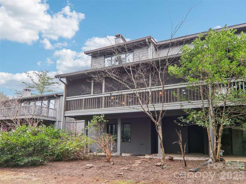 457 Crowfields Drive, Asheville, NC 28803.  MLS# CAR4357281, YatesRealty ID 3870. Exterior daylight entrance to unfinished basement for storage and easy access