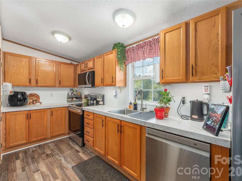 40 Farmstead Road, Leicester, NC 28748.  MLS# CAR4404206, YatesRealty ID 38703. 