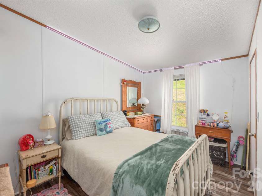40 Farmstead Road, Leicester, NC 28748.  MLS# CAR4404206, YatesRealty ID 38703. 
