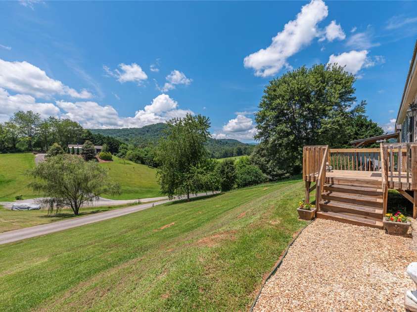 40 Farmstead Road, Leicester, NC 28748.  MLS# CAR4404206, YatesRealty ID 38703. 