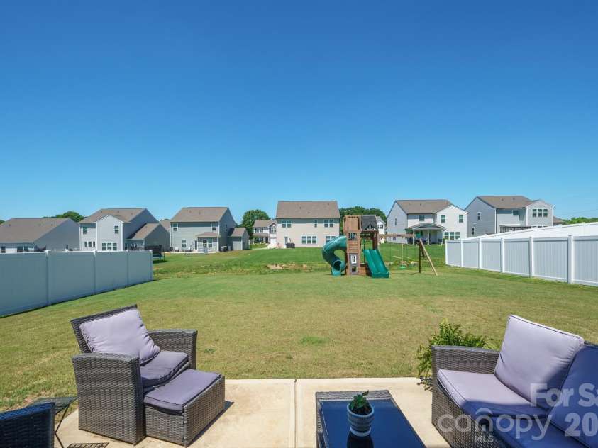 1295 Elizabeth Avenue, Kannapolis, NC 28083.  MLS# CAR4388265, YatesRealty ID 38707. Large, flat backyard