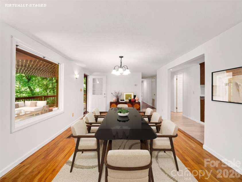 125 Heartland Lane, Burnsville, NC 28714.  MLS# CAR4273356, YatesRealty ID 3871. Large dining for family gatherings!