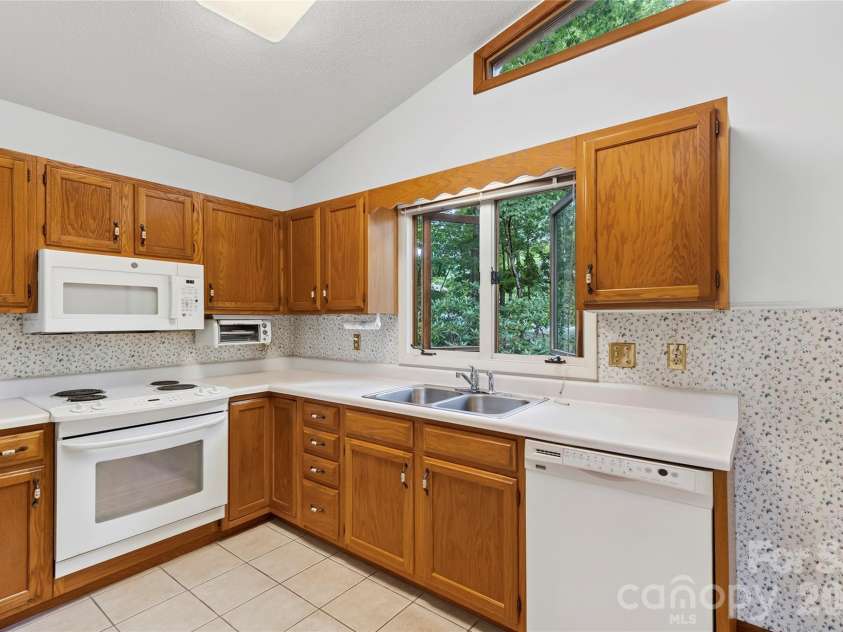 109 Usdasdi Drive, Brevard, NC 28712.  MLS# CAR4405898, YatesRealty ID 38717. Original kitchen offering great potential for future updates