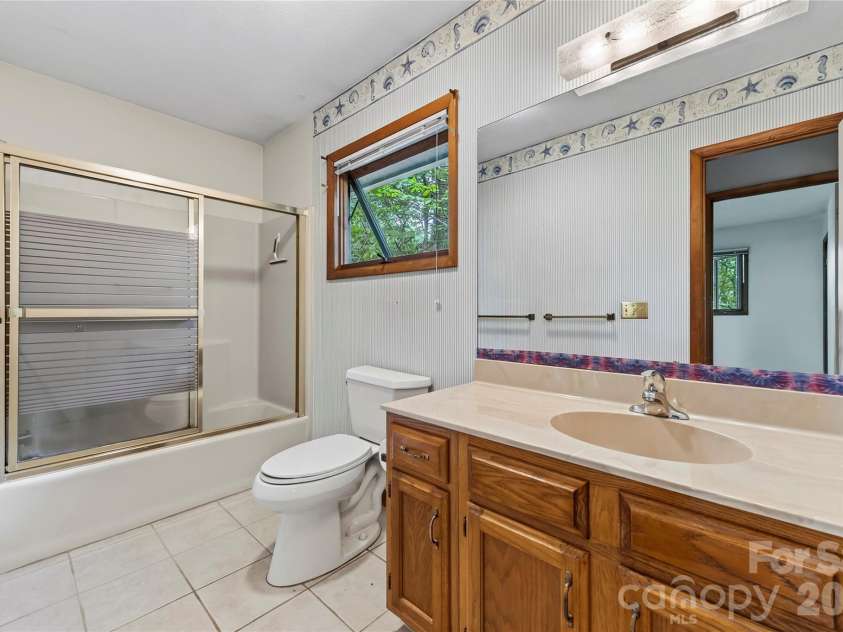 109 Usdasdi Drive, Brevard, NC 28712.  MLS# CAR4405898, YatesRealty ID 38717. Private ensuite bathroom