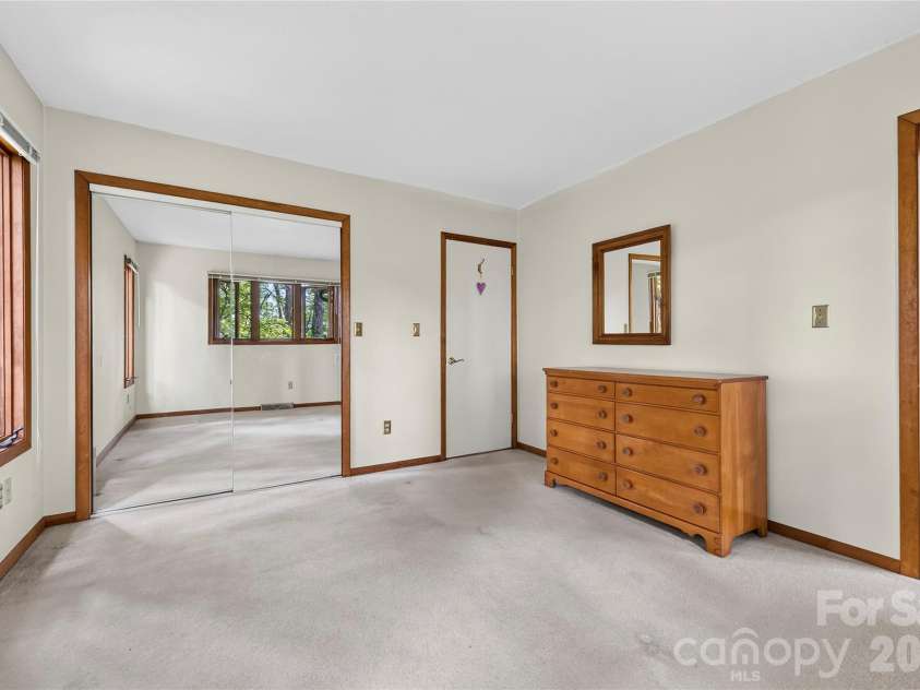 109 Usdasdi Drive, Brevard, NC 28712.  MLS# CAR4405898, YatesRealty ID 38717. Second main-level bedroom