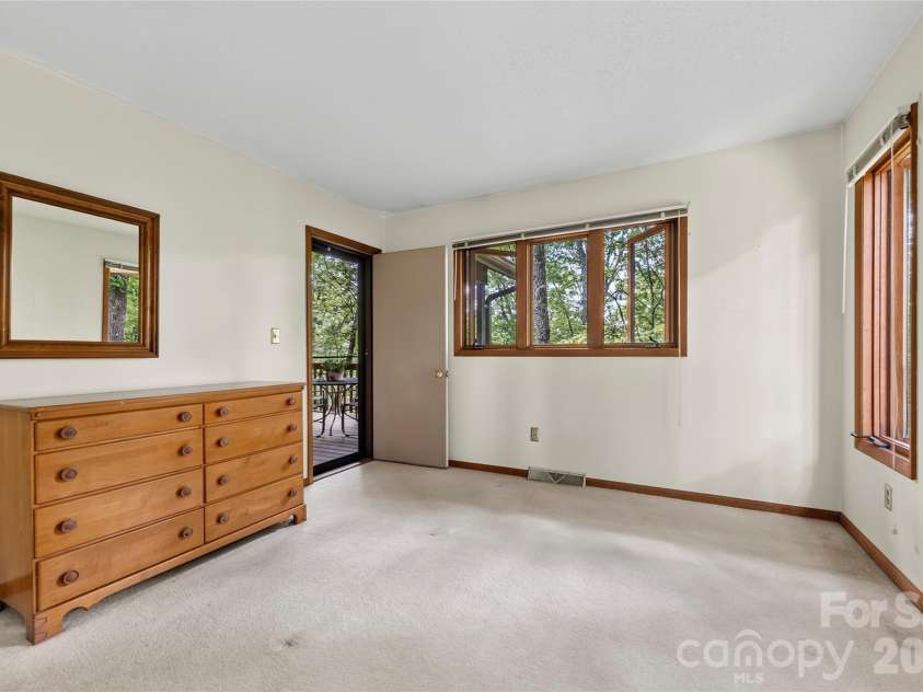 109 Usdasdi Drive, Brevard, NC 28712.  MLS# CAR4405898, YatesRealty ID 38717. Sliding doors open to the outdoor deck.
