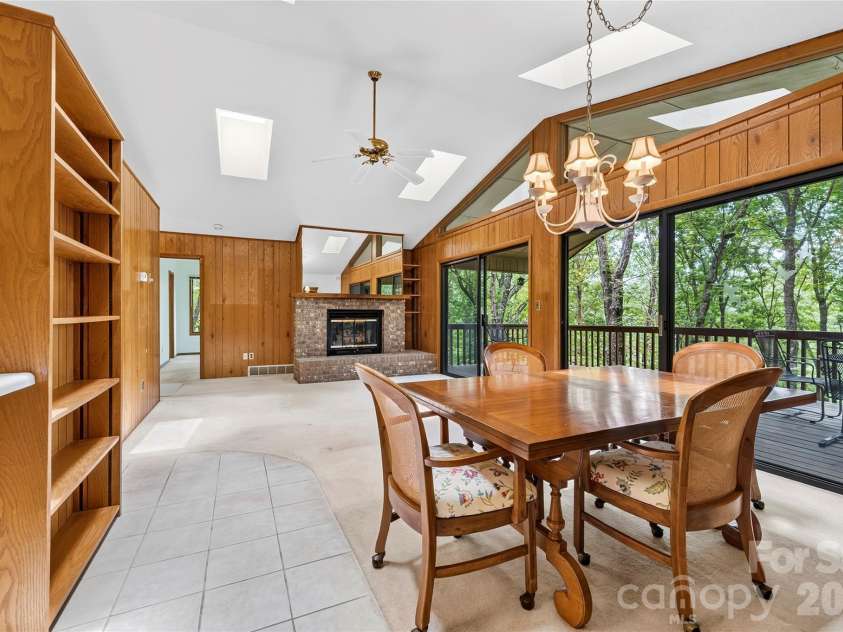 109 Usdasdi Drive, Brevard, NC 28712.  MLS# CAR4405898, YatesRealty ID 38717. Sliding doors provide easy access to the deck