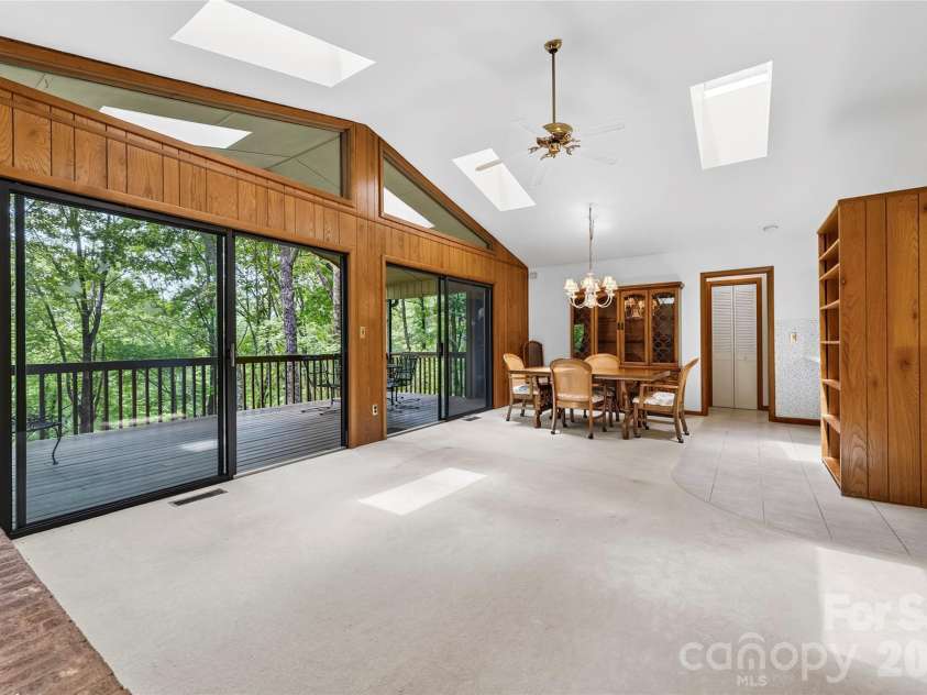 109 Usdasdi Drive, Brevard, NC 28712.  MLS# CAR4405898, YatesRealty ID 38717. Vaulted ceiling creates an open and inviting living space