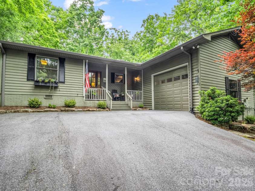558 Middle Connestee Trail, Brevard, NC 28712.  MLS# CAR4391380, YatesRealty ID 38722. 