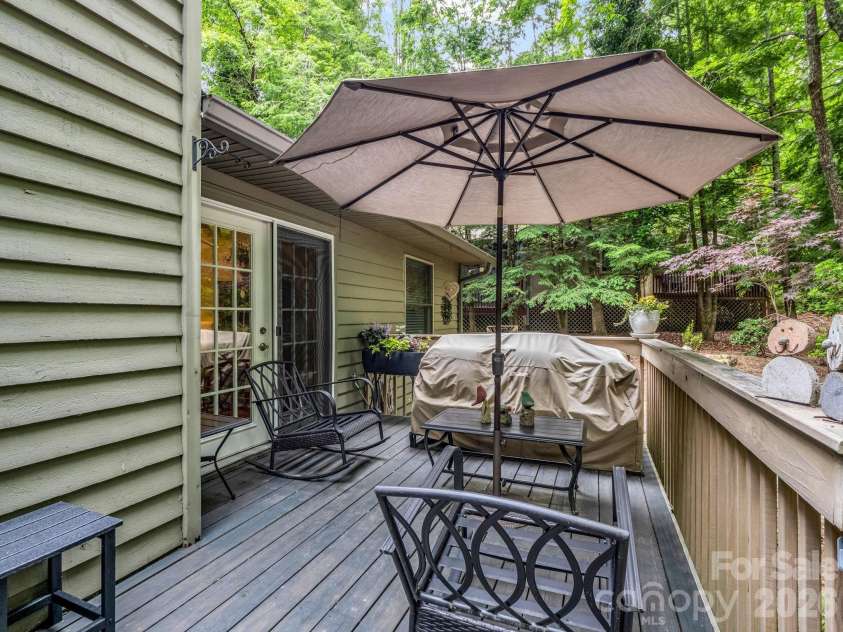 558 Middle Connestee Trail, Brevard, NC 28712.  MLS# CAR4391380, YatesRealty ID 38722. Back Patio