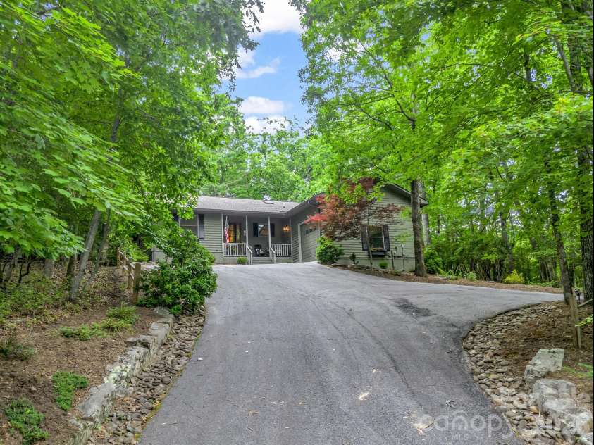 558 Middle Connestee Trail, Brevard, NC 28712.  MLS# CAR4391380, YatesRealty ID 38722. Driveway Entrance
