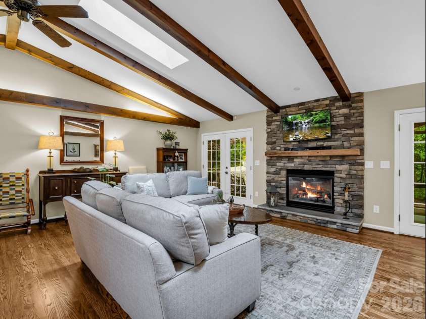 558 Middle Connestee Trail, Brevard, NC 28712.  MLS# CAR4391380, YatesRealty ID 38722. Great Room w/Gas Fireplace